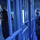 Eugene Byrd and David Ramsey in Arrow (2012)