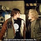 Scud (Norman Reedus, left) and Whistler (Kris Kristofferson) debate in New Line Cinema's action thriller, BLADE II. 