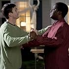 Ashton Kutcher (l) and Bernie Mac star in Columbia Pictures/Regency Enterprises' new comedy Guess Who.     