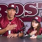 Dwayne Johnson and Madison Pettis in The Game Plan (2007)