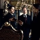 Robert Downey Jr., James Fox, William Hope, and Hans Matheson in Sherlock Holmes (2009)