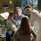 Rachel Weisz, Daniel Craig, Taylor Geare, and Claire Geare in Dream House (2011)