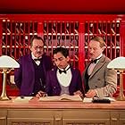 Owen Wilson, Larry Pine, and Tony Revolori in The Grand Budapest Hotel (2014)