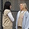 Laura Prepon and Taylor Schilling in Orange Is the New Black (2013)