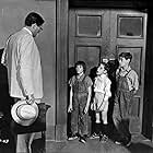 Gregory Peck, Mary Badham, Phillip Alford, and John Megna in To Kill a Mockingbird (1962)