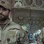 Bradley Cooper and Luke Grimes in American Sniper (2014)