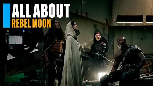 Filmmaker Zack Snyder takes us to a different galaxy far, far away for his take on an epic space opera. 'Rebel Moon' follows Kora (Sofia Boutella), a former soldier for a corrupt galactic government. She recruits a team of rebels, mercenaries, and warriors, including Charlie Hunnam (Kai), Djimon Hounsou (General Titus), Doona Bae (Nemesis), Ray Fisher (Darrian Bloodaxe), Cleopatra Coleman (Devra Bloodaxe), and Anthony Hopkins, voicing a robot knight named Jimmy. Kora and her crew seek revenge on the tyrannical Regent Balisarius (Fra Free) and his evil right-hand man Admiral Atticus Noble (Ed Skrein). With its evil empire, space rebels, and robots with funny names, 'Rebel Moon' will likely remind you of Star Wars, which makes sense, because Zack Snyder initially pitched the idea to Lucasfilm as an extension of the Star Wars Universe. "It was me saying, 'Give me the keys and let me take it for a spin,'" admits the writer-director. But when Disney purchased Lucasfilm, Snyder began to retailor his story to stand on its own. And like Star Wars, Snyder sees the film as just the beginning of a franchise with two more films in the works as well as a video game, an animated short, and a graphic novel. Snyder also promises extended R-rated cuts of the films, much like he's done with 'Justice League' (2021) and 'Batman v. Superman: Dawn of Justice' (2016). 'Rebel Moon' hits Netflix in December 2023, with a limited theatrical run still being planned.