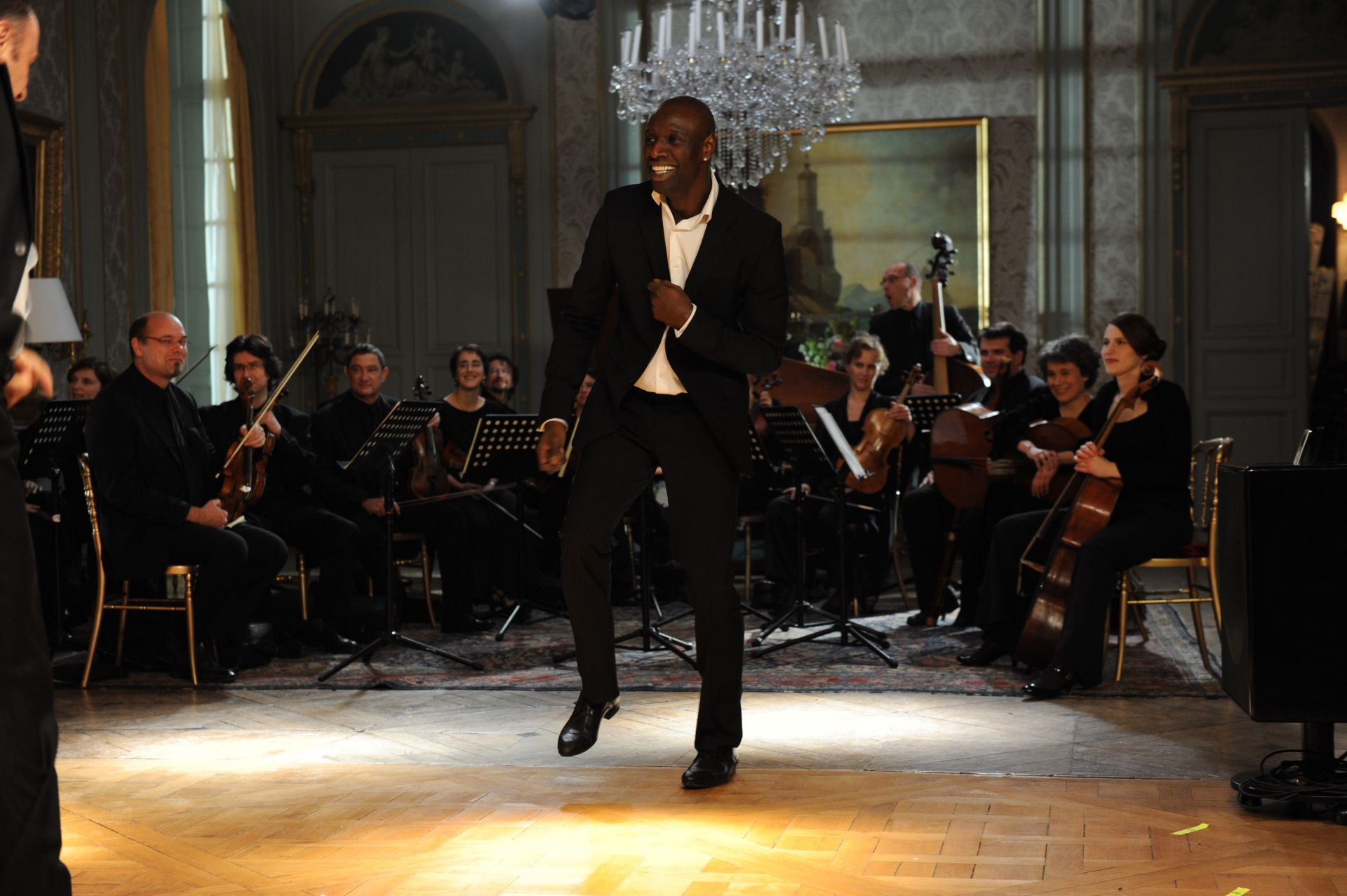 Omar Sy, Le Capriccio Français, and Philippe Le Fevre in The Intouchables (2011)