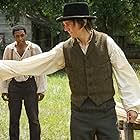 Paul Dano and Chiwetel Ejiofor in 12 Years a Slave (2013)