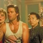 Kim Cattrall, Kurt Russell, Dennis Dun, and Suzee Pai in Big Trouble in Little China (1986)
