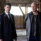 Bruce Willis and Karl Urban in RED (2010)