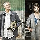 George Clooney and Filippo Timi in The American (2010)