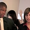 Sharif Atkins and Natalie Morales in White Collar (2009)