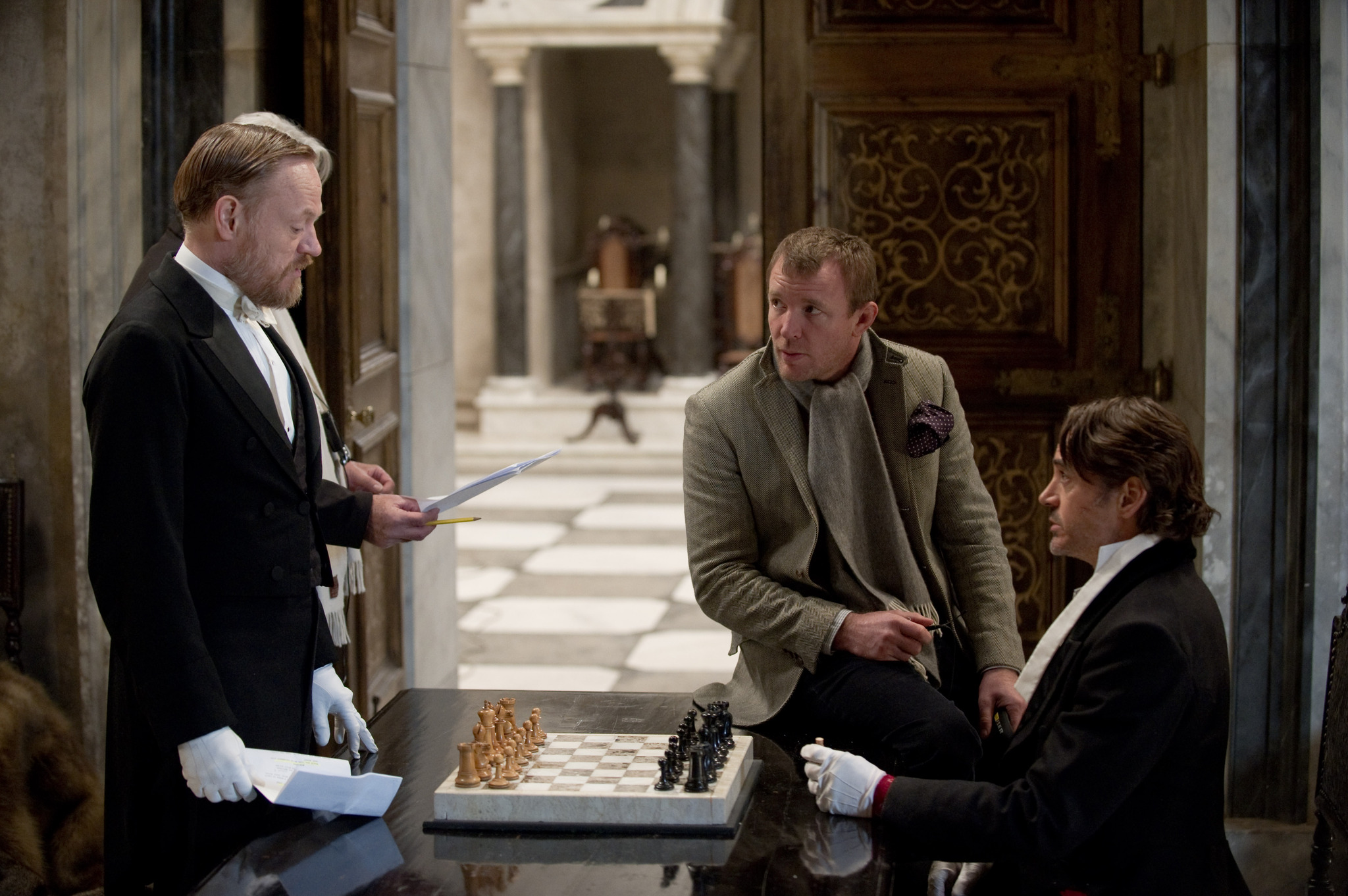 Robert Downey Jr., Guy Ritchie, and Jared Harris in Sherlock Holmes: A Game of Shadows (2011)