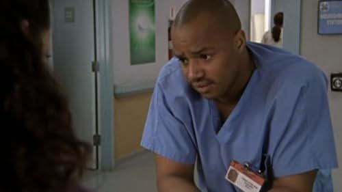 Donald Faison and Judy Reyes in Scrubs (2001)