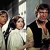 Harrison Ford, Carrie Fisher, and Mark Hamill in Star Wars (1977)