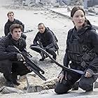 Evan Ross, Jennifer Lawrence, Liam Hemsworth, and Sam Claflin in The Hunger Games: Mockingjay - Part 2 (2015)