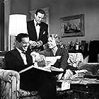 Grace Kelly, Ray Milland, and Robert Cummings in Dial M for Murder (1954)