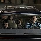 Henry Thomas, Mckenna Grace, Lulu Wilson, Julian Hilliard, Paxton Singleton, and Violet McGraw in The Haunting of Hill House (2018)