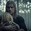 Henry Cavill and Freya Allan in The Witcher (2019)