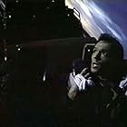 Max (John Pyper-Ferguson) holds on tight to a runaway coaster in David Winning's KILLER IMAGE (1992)