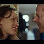 Noah Emmerich and Kerry Bishé in The Fitzgerald Family Christmas (2012)