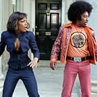 Aunjanue Ellis-Taylor and Eddie Griffin in Undercover Brother (2002)