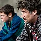 Benicio Del Toro and Eldar Residovic in A Perfect Day (2015)