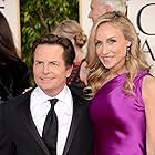 Michael J. Fox and Tracy Pollan at an event for 70th Golden Globe Awards (2013)