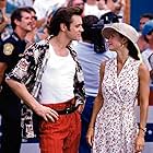 Jim Carrey, Courteney Cox, and Chaz Mena in Ace Ventura: Pet Detective (1994)