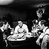 Orson Welles, Joseph Cotten, Erskine Sanford, and Everett Sloane in Citizen Kane (1941)