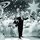 Paulita Arvizu, Joy Barlow, Janet Barrett, Eddie Cantor, Dorothy Dayton, Igor Dega, and Doris Ake in Thank Your Lucky Stars (1943)