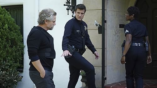 Nathan Fillion, Jonno Roberts, and Afton Williamson in The Rookie (2018)