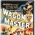 Joanne Dru and Ben Johnson in Wagon Master (1950)