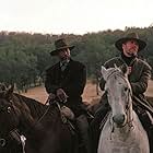 Clint Eastwood, Morgan Freeman, and Jaimz Woolvett in Unforgiven (1992)