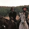 Clint Eastwood, Morgan Freeman, and Jaimz Woolvett in Unforgiven (1992)