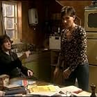 Tamsin Greig and Dylan Moran in Black Books (2000)