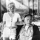 Kirk Douglas and Olivia d'Abo in Greedy (1994)