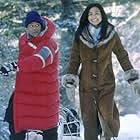 Cuba Gooding Jr. and Joanna Bacalso in Snow Dogs (2002)