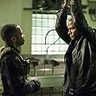 Eugene Byrd and David Ramsey in Arrow (2012)