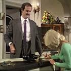John Cleese and Luan Peters in Fawlty Towers (1975)