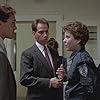 Nancy Allen, Miguel Ferrer, and Robert DoQui in RoboCop (1987)