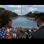 Left to right Richard D'Alessandro as Abbie Hoffman and Tom Hanks As "Forrest Gump." Two of greatest men in our history JFK and MLK stood years before. What an incredible shot.