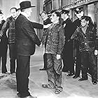 Charles Chaplin, Richard Alexander, Pat Harmon, and Bruce Mitchell in Modern Times (1936)