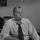 Emile Meyer in Riot in Cell Block 11 (1954)