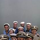 "McHale's Navy" (back row, left to right) Edson Stroll, John Wright, Carl Ballantine, Gary Vinson (middle row, left to right) Billy Sands, Gavin MacLeod, Bob Hastings (front row, left to right) Joe Flynn, Yoshio Yoda, Ernest Borgnine, Tim Conway