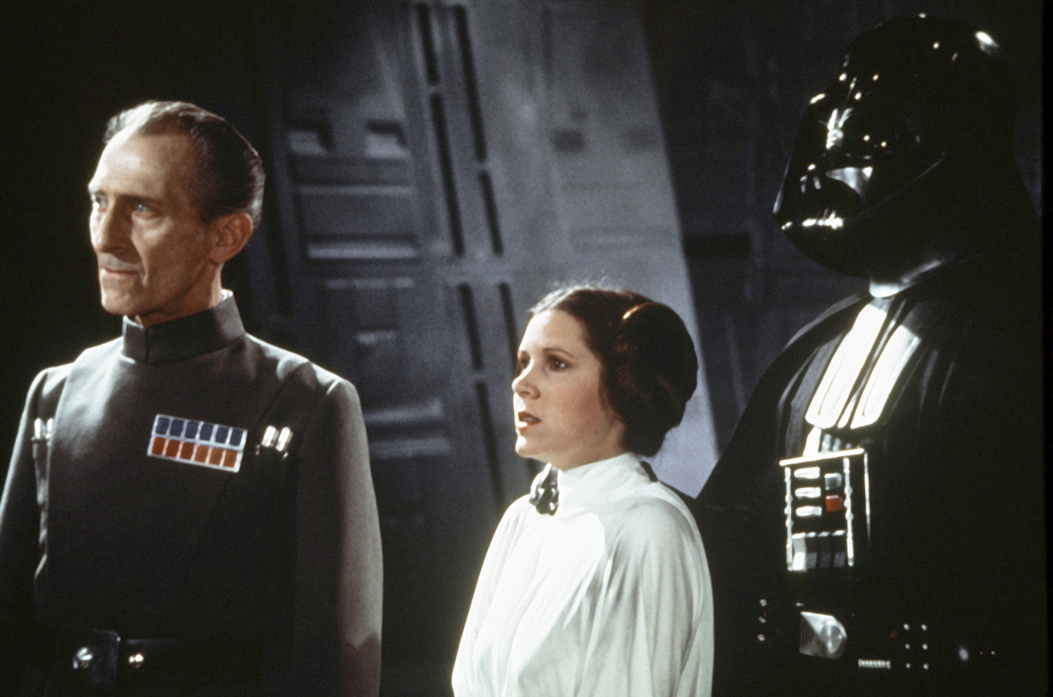 Carrie Fisher, James Earl Jones, Peter Cushing, and David Prowse in Star Wars: Episode IV - A New Hope (1977)