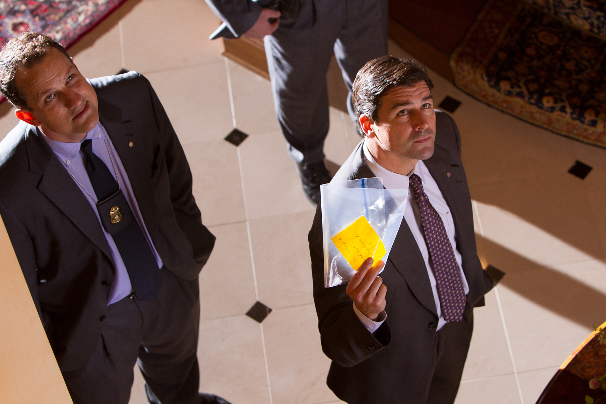 Kyle Chandler and Ted Griffin in The Wolf of Wall Street (2013)