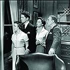Leo G. Carroll, Farley Granger, Patricia Hitchcock, and Ruth Roman in Strangers on a Train (1951)