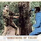 Rock Hudson and Sidney Poitier in Something of Value (1957)